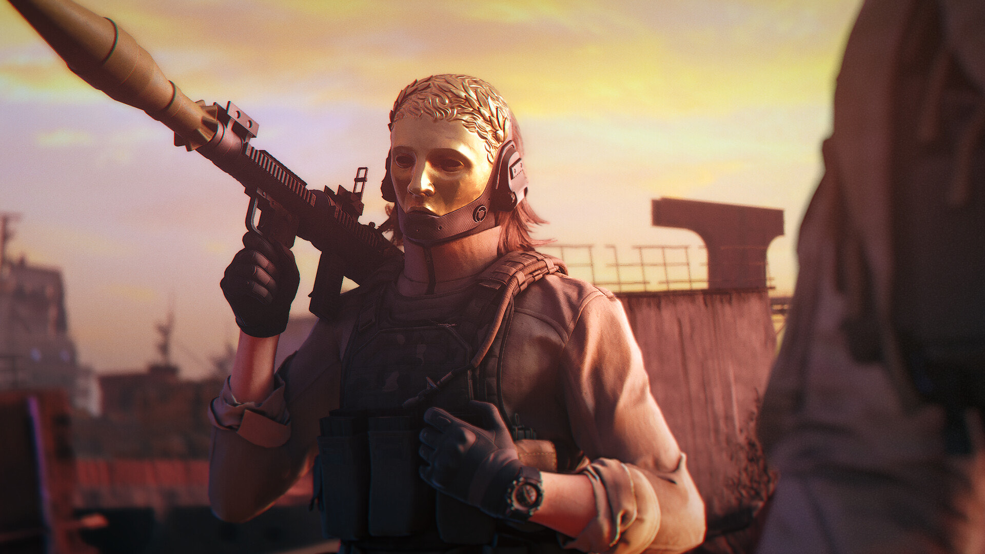 An armed figure in a gold mask shouldering a suppressed rifle at dusk.